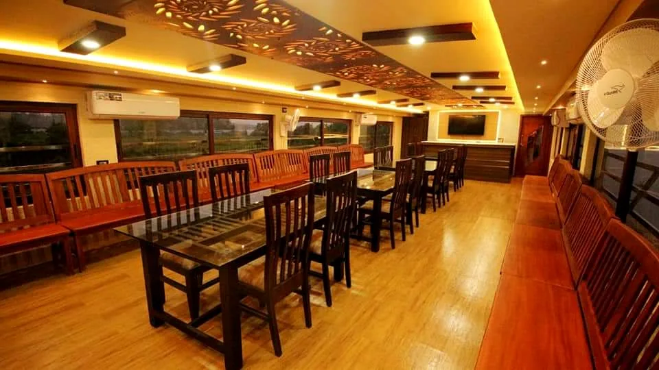 Large dining space aboard Layanila Houseboats