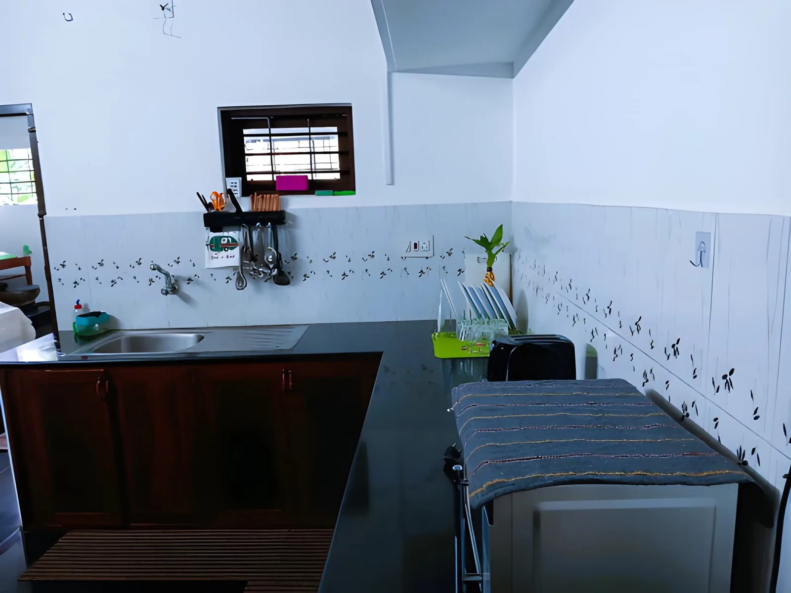 Kitchen and work area at Layanila